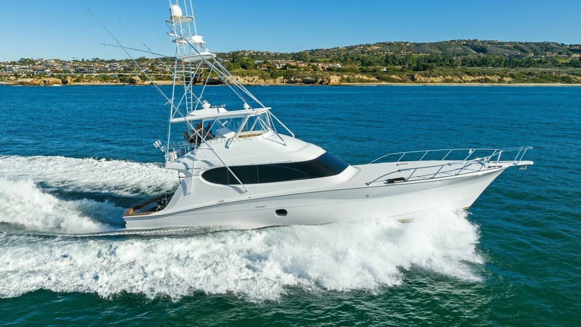 2007 Hatteras 64 Convertible CHUPACABRA - Starboard Profile Underway in Open Water