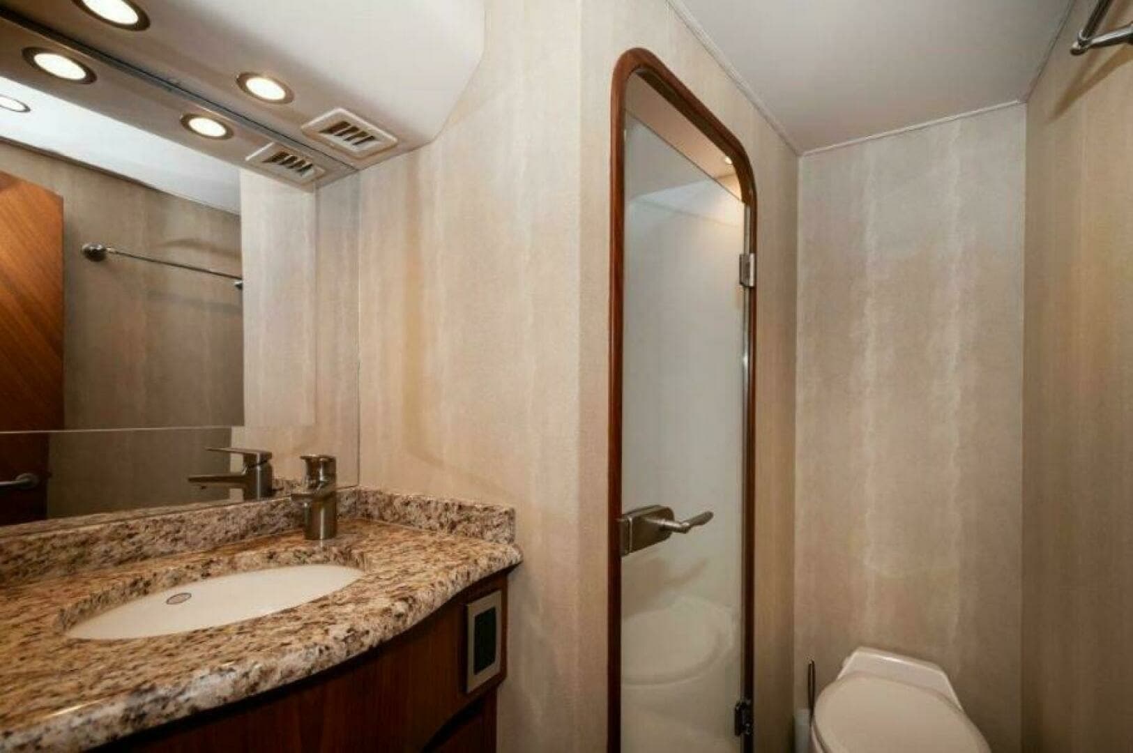 2012 76 Viking Sky Bridge Barefoot Drive Guest Head (1)