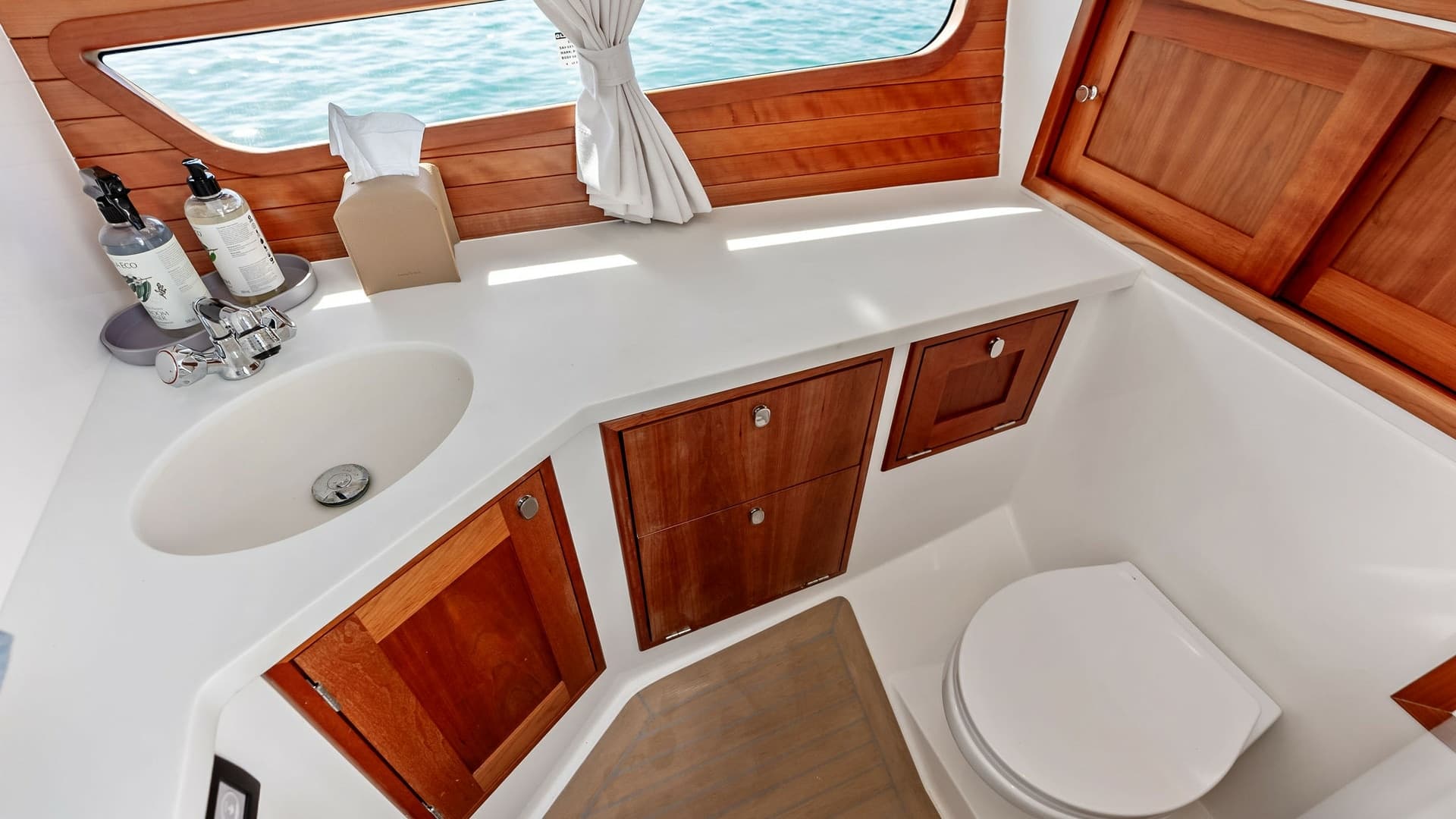 Elegant Yacht Head with Wood Accents
