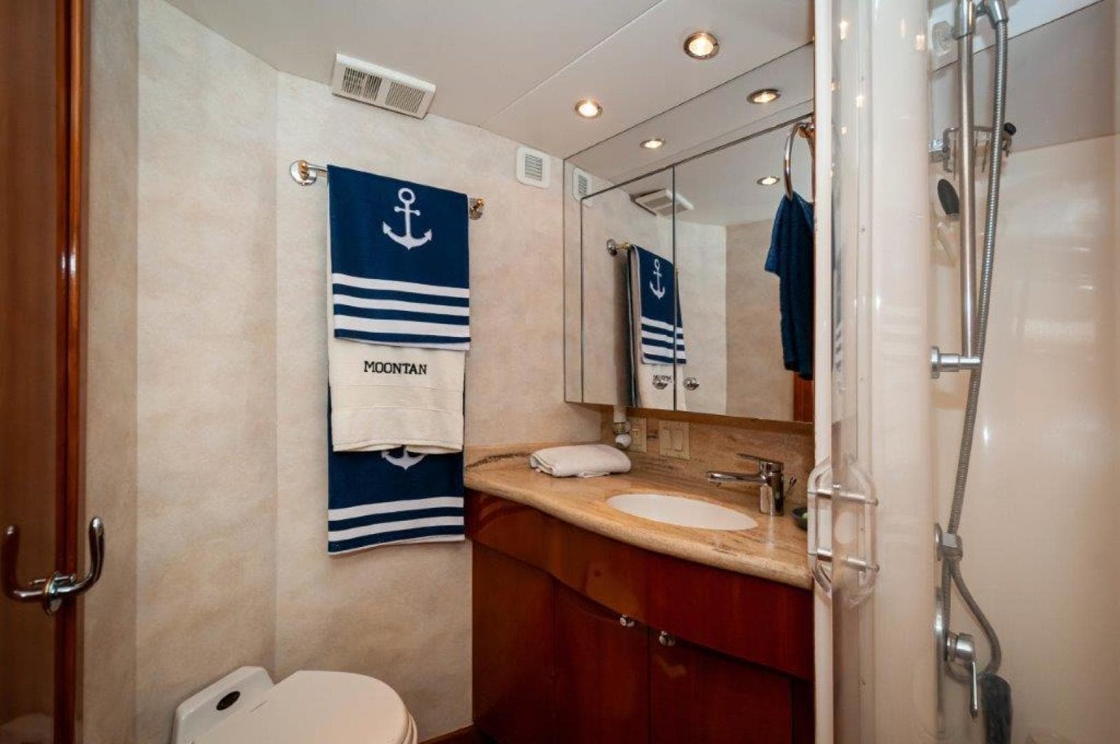 2002 65 Hatteras Convertible Moontan VIP Head (1)