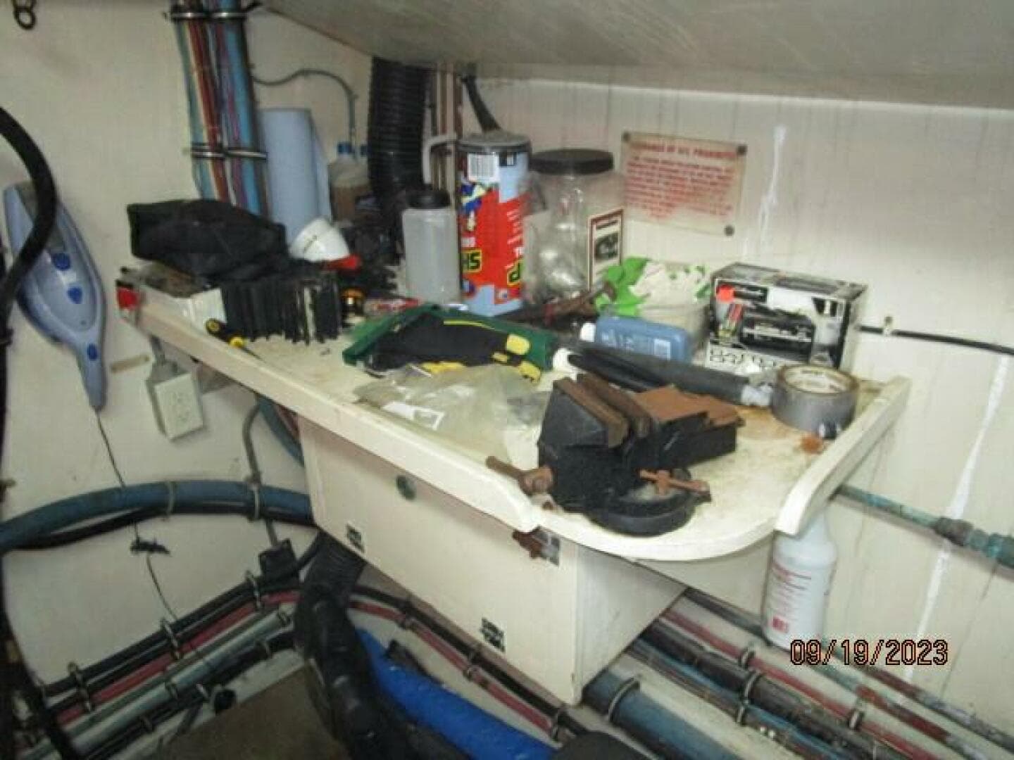 63' Hatteras starboard engine room workbench