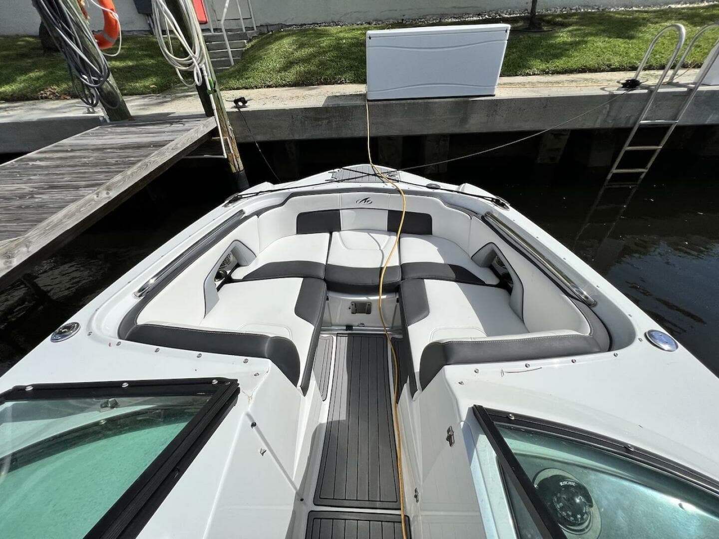 2022 Monterey M-45 boat docked, featuring spacious seating and modern design.
