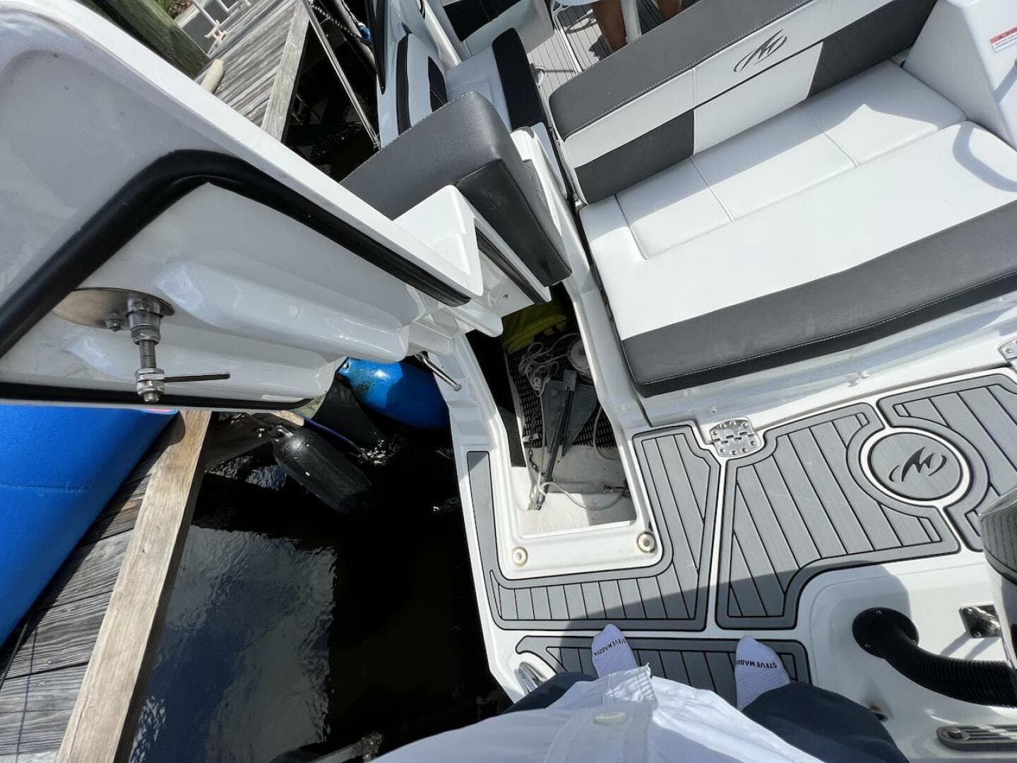 2022 Monterey M-45 boat interior with seating and deck details at a dock.