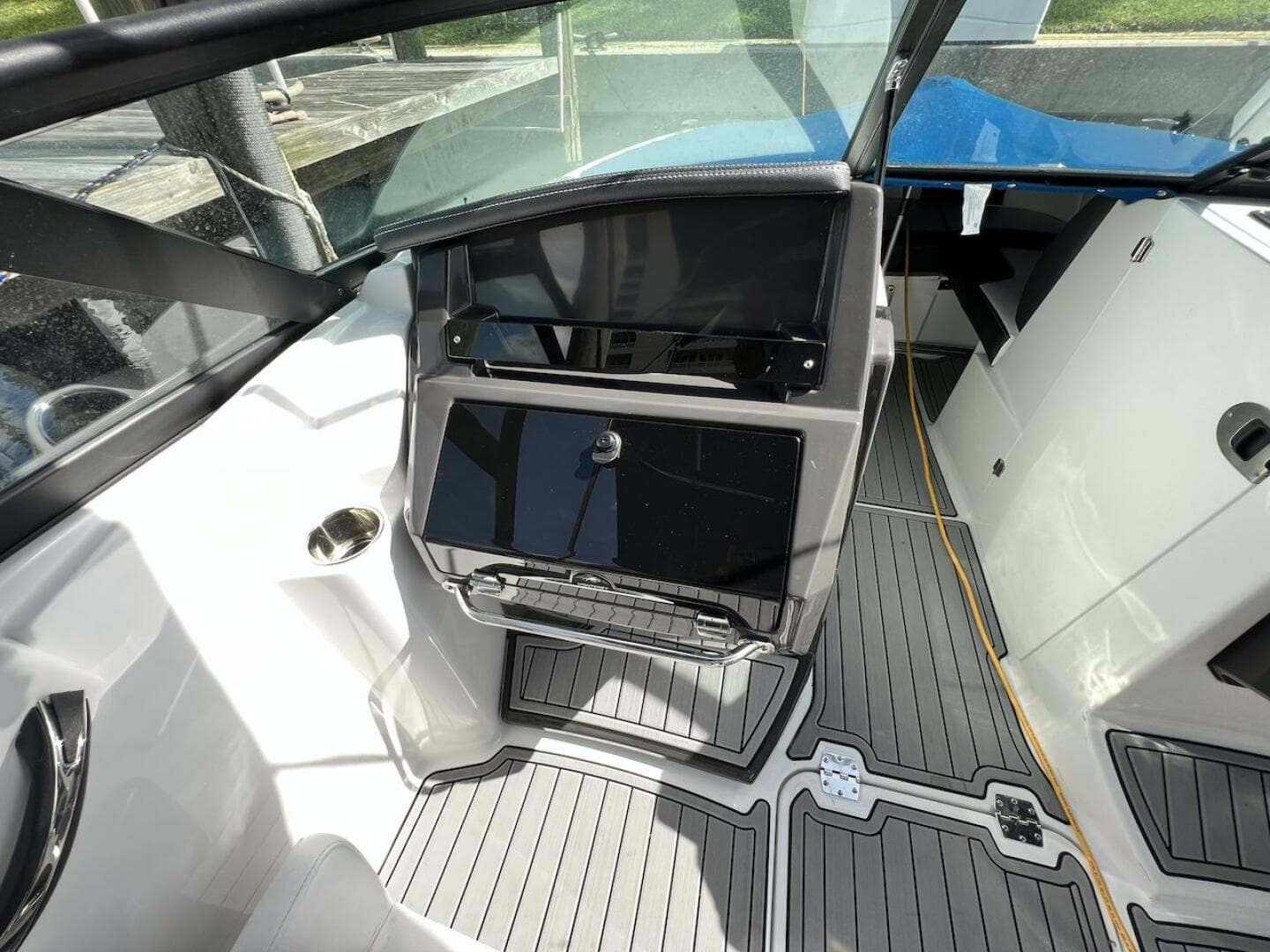 Interior of a 2022 Monterey M-45 boat with modern dashboard and seating.