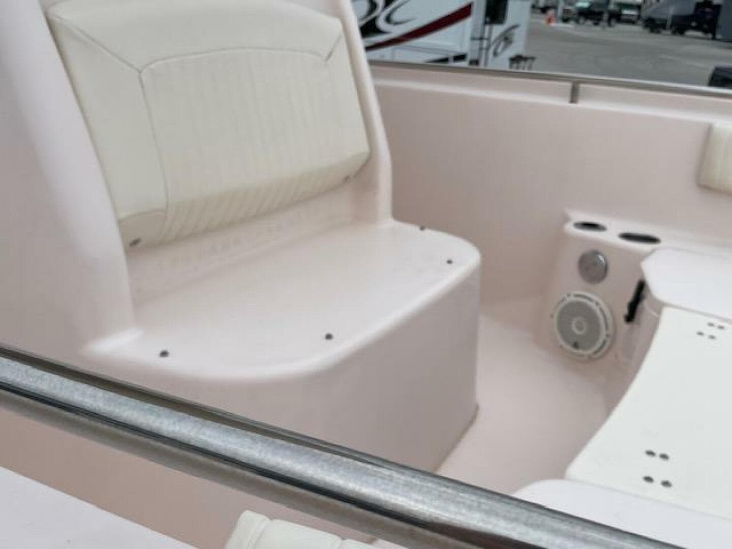 2014 Grady-White Fisherman 257 boat interior with seating and speaker.