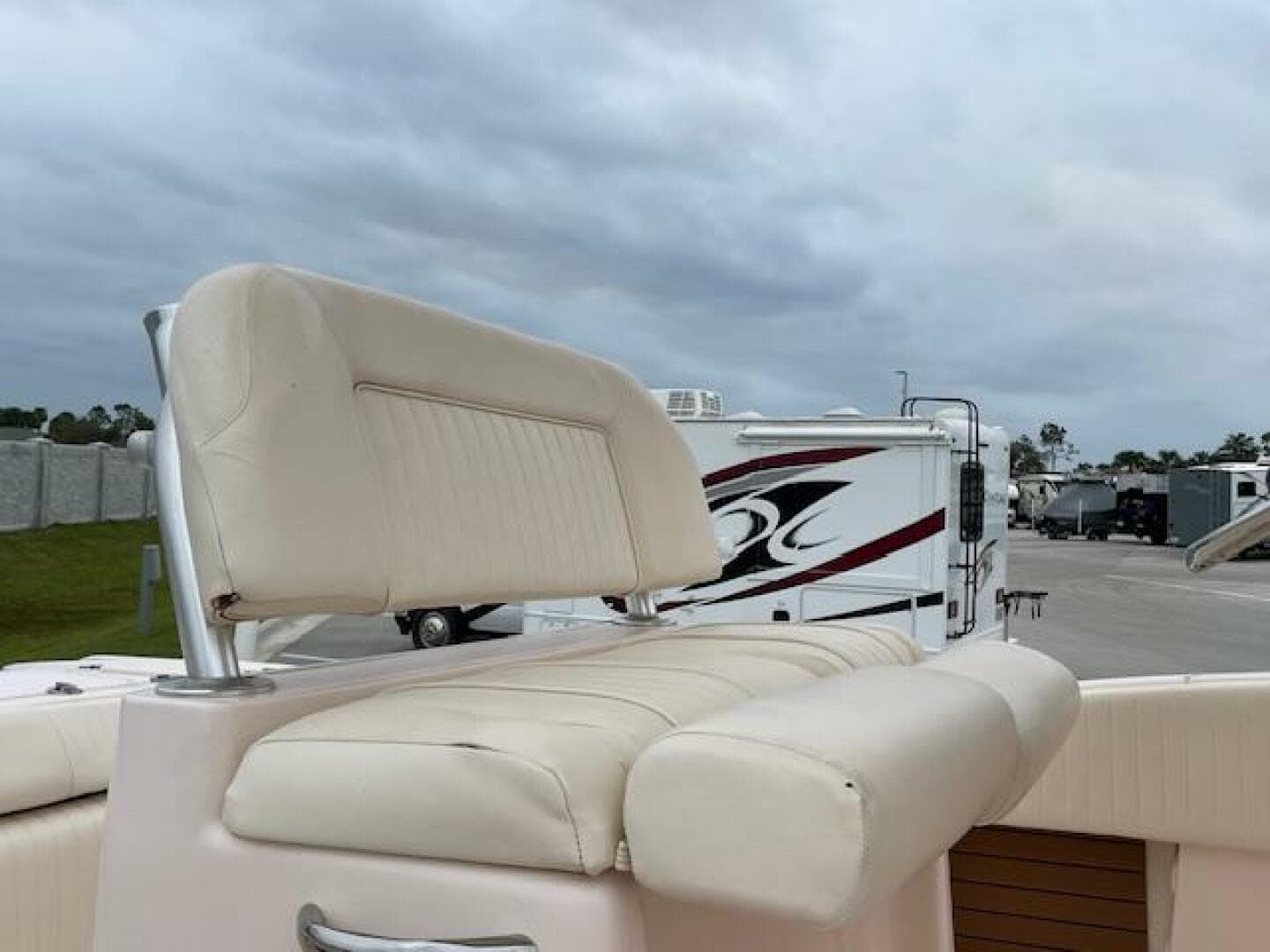 2014 Grady-White Fisherman 257 boat seat with RVs in the background.