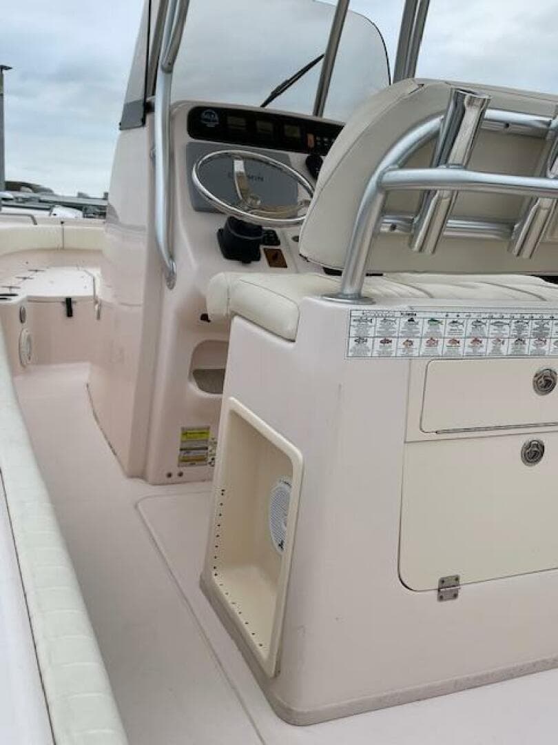 2014 Grady-White Fisherman 257 center console boat interior with helm and seating.