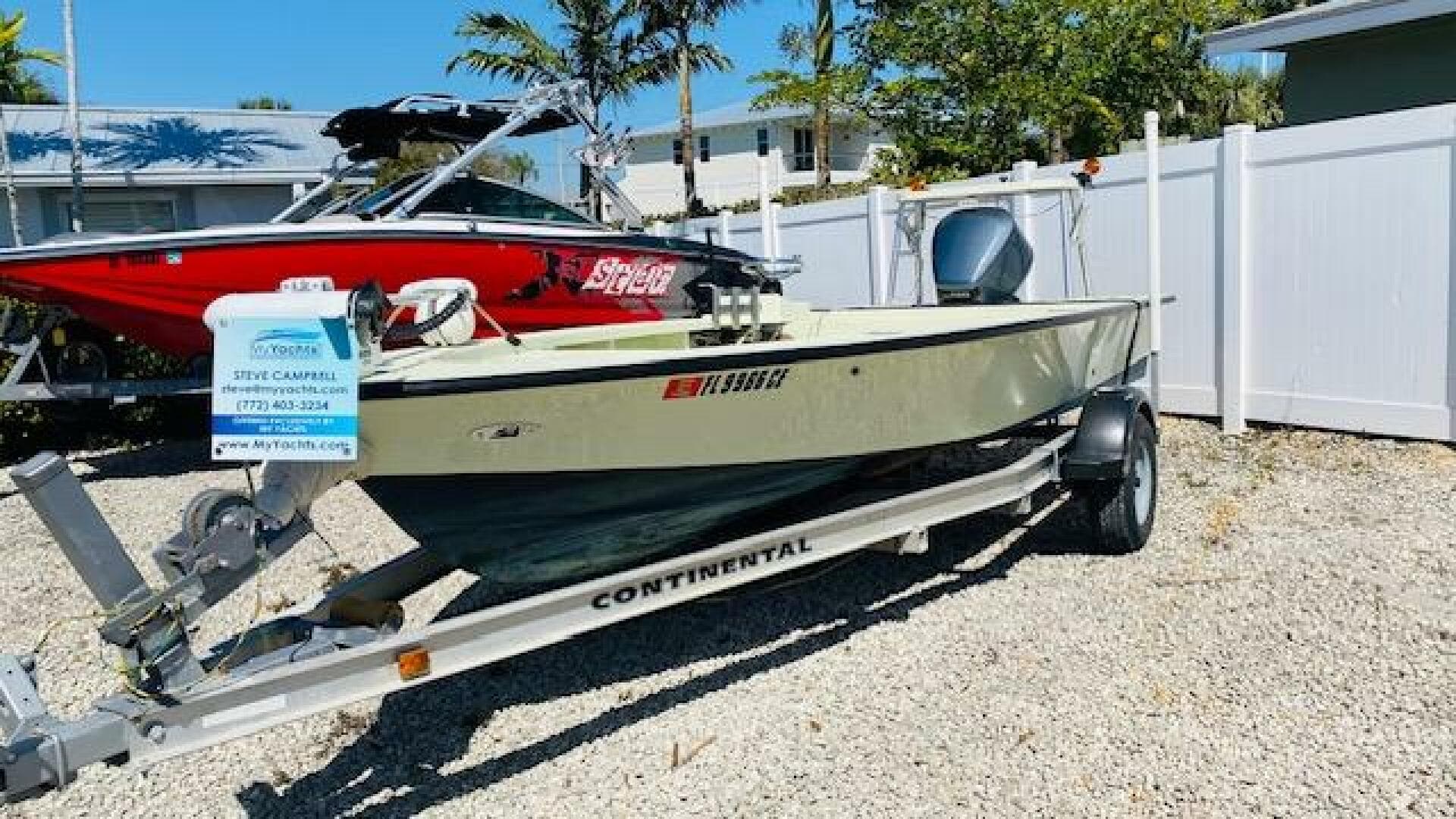 1983 Maverick 18 Flats Boat on Continental trailer in outdoor setting.