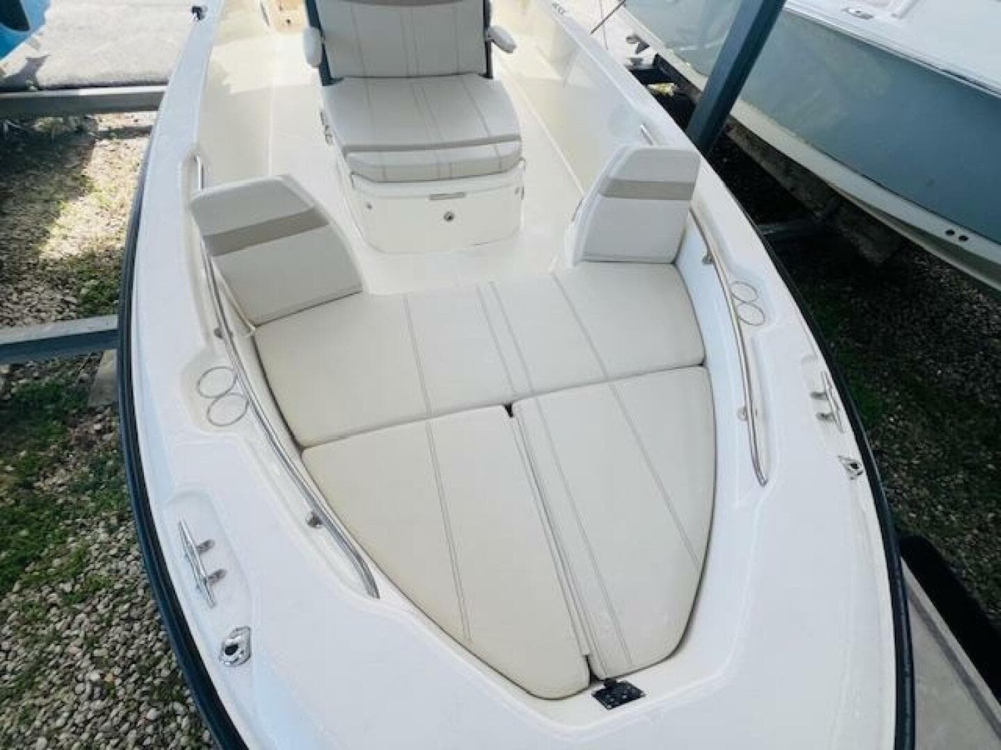 2023 Boston Whaler 250 Dauntless boat interior with cushioned seating and spacious deck.