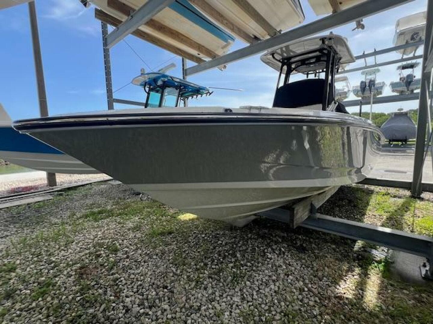 2023 Boston Whaler 250 Dauntless boat on a rack, side view.