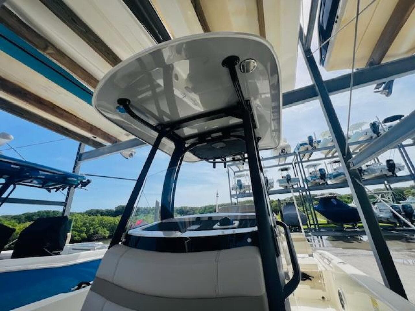 2023 Boston Whaler 250 Dauntless boat in storage, showcasing sleek design and sturdy construction.