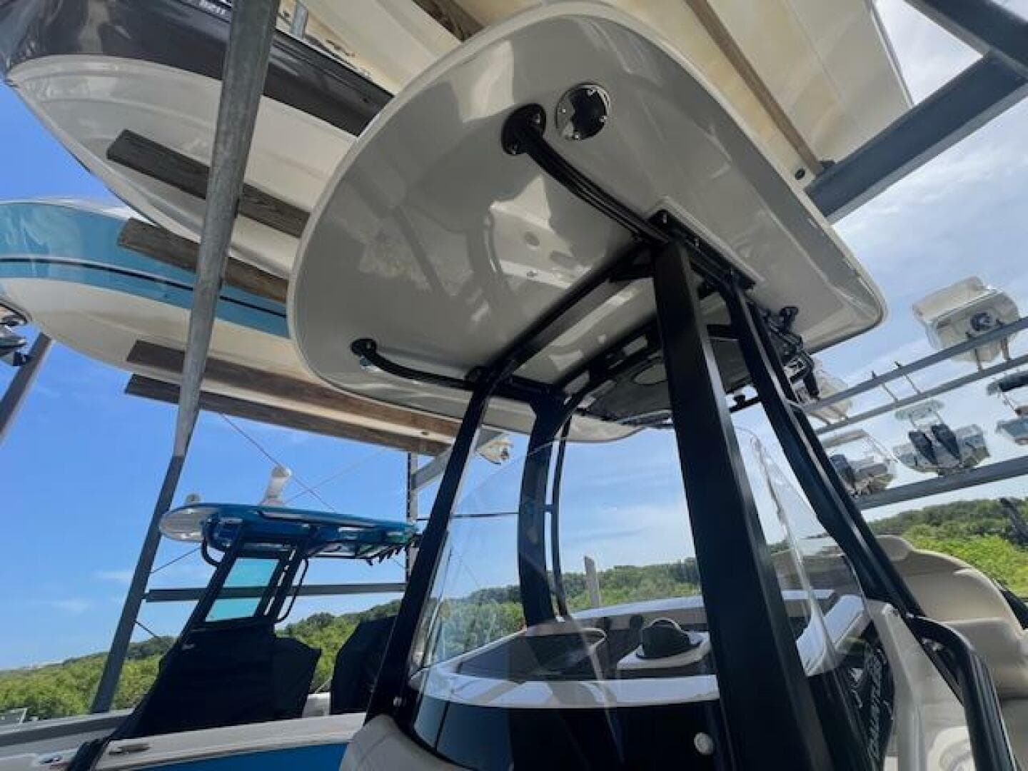 2023 Boston Whaler 250 Dauntless boat in storage, showcasing sleek design and modern features.