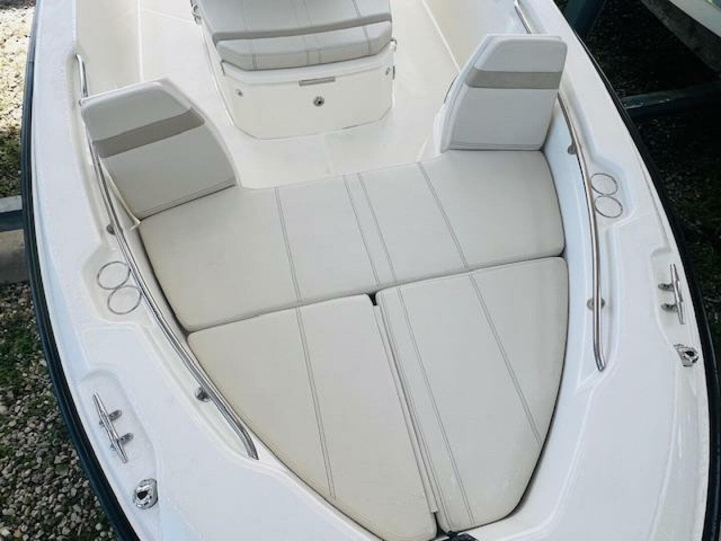 2023 Boston Whaler 250 Dauntless boat interior with cushioned seating.