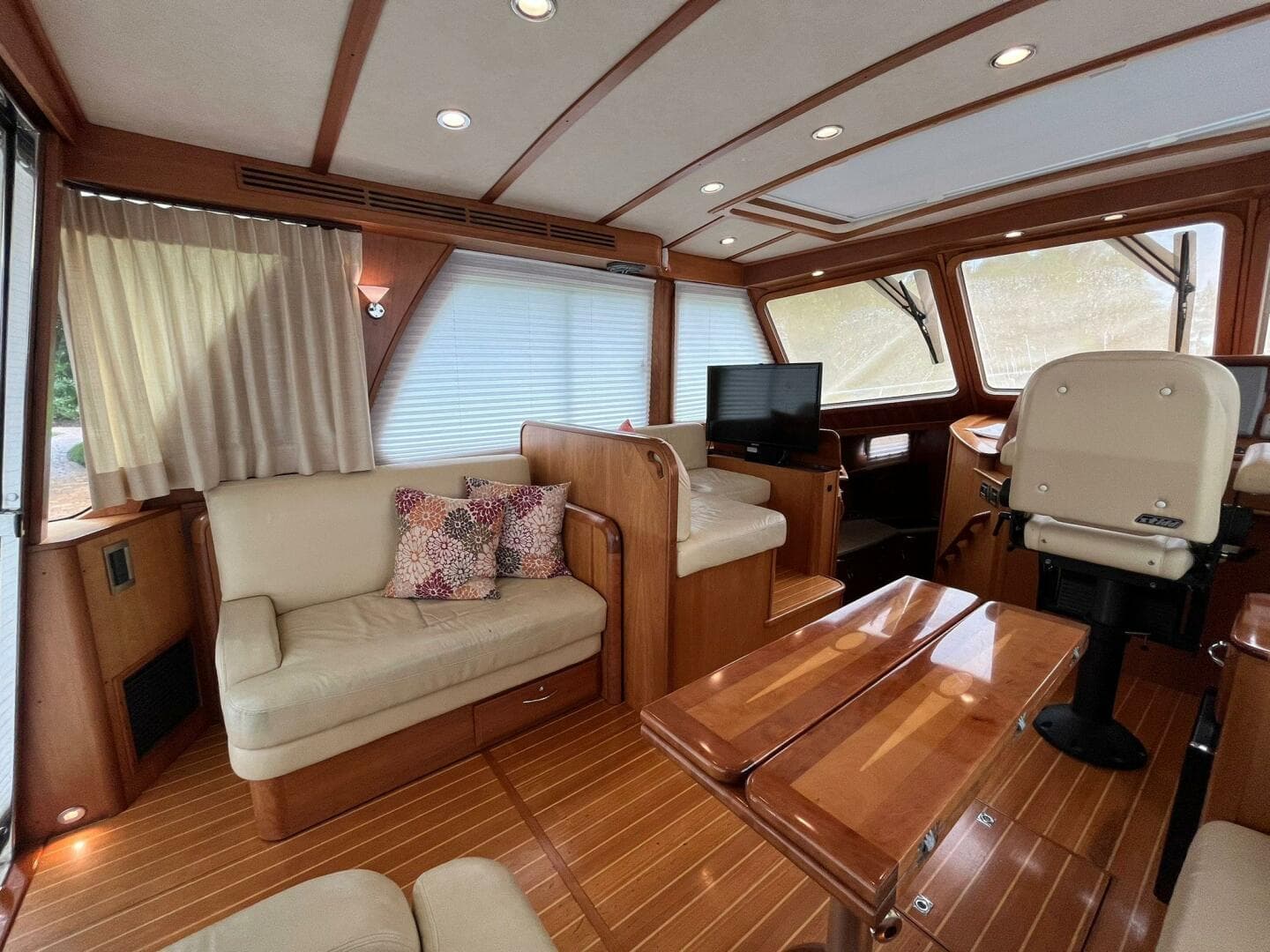 2013 Sabre 48 Salon Express interior with elegant wood finish and comfortable seating.
