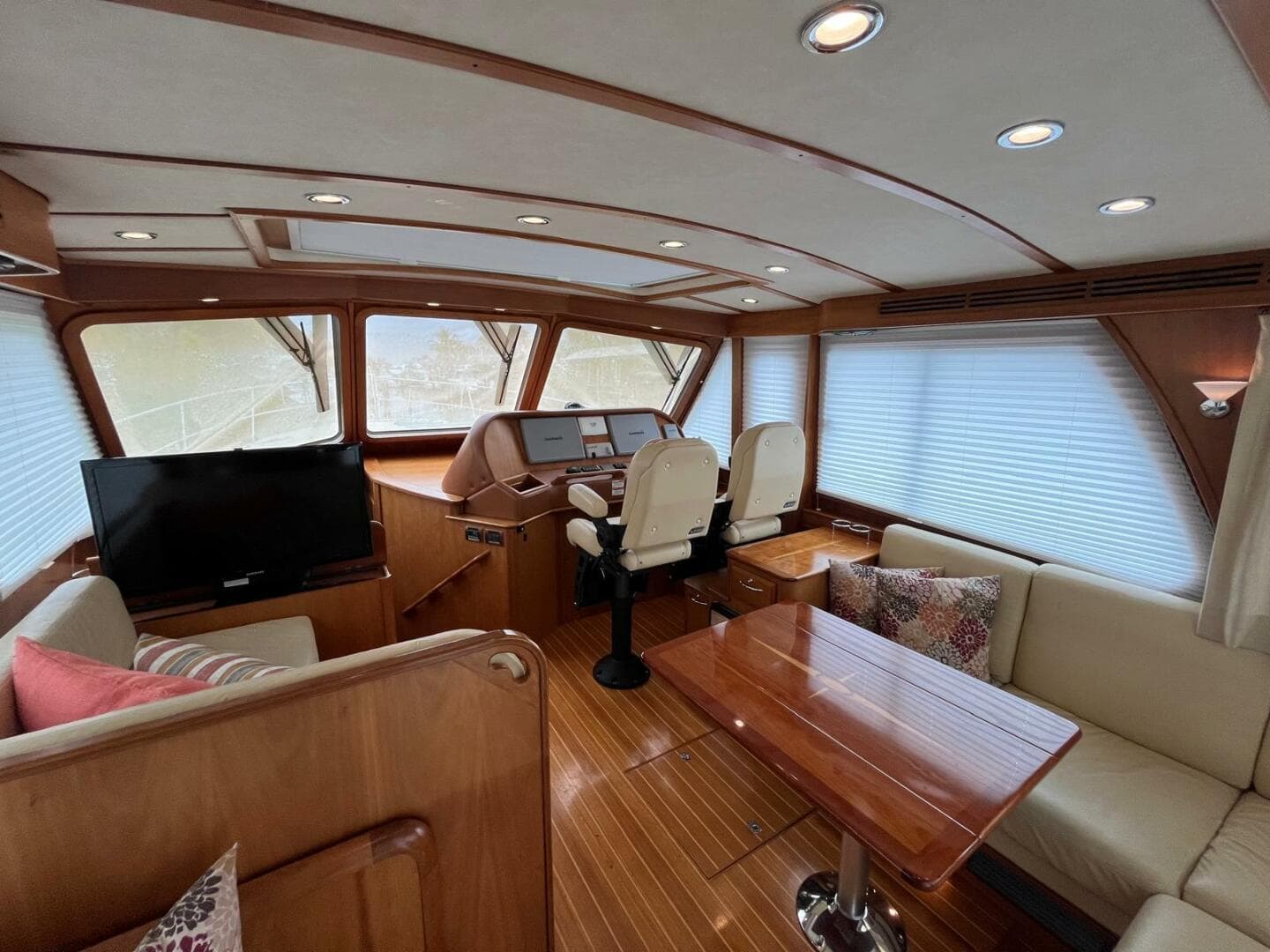 Interior of 2013 Sabre 48 Salon Express yacht with elegant seating and helm.