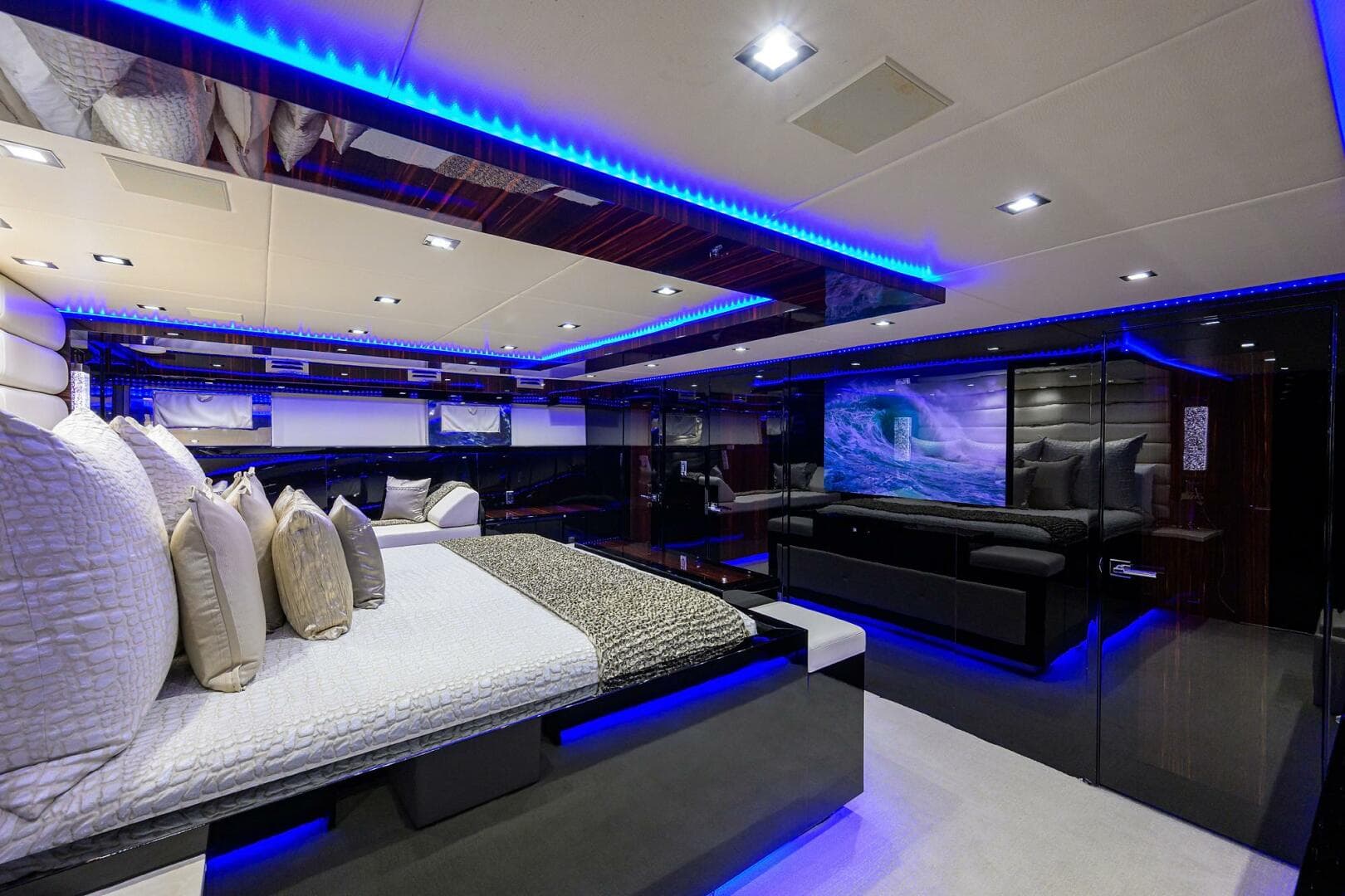 Luxurious interior of 1997 Broward 108 Raised Pilothouse yacht with modern lighting.