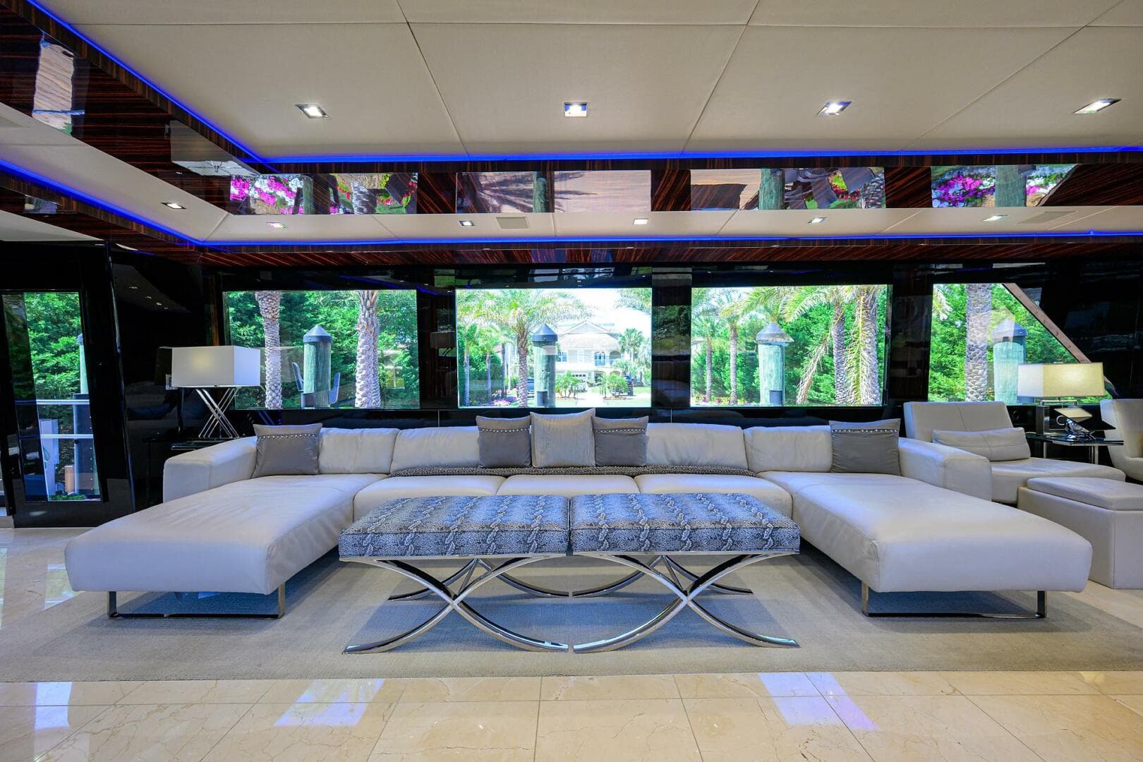 Luxurious interior of 1997 Broward 108 Raised Pilothouse yacht with modern furnishings.