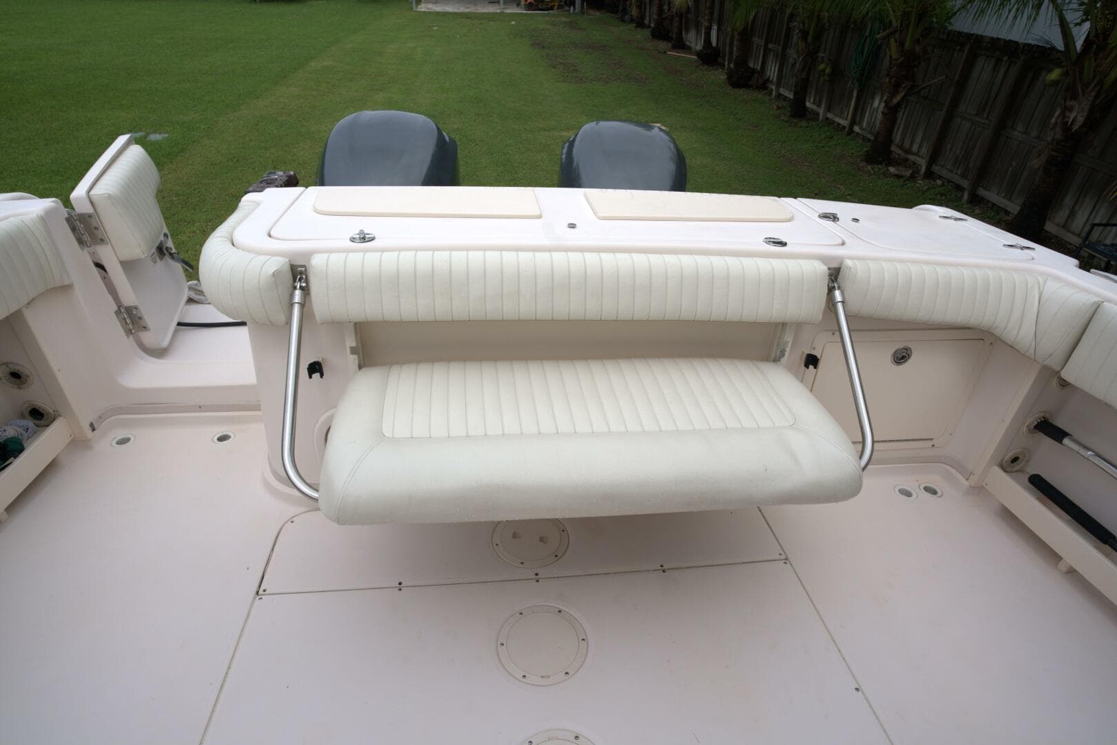 2007 Grady-White Express 330 boat with foldable seating and dual engines.