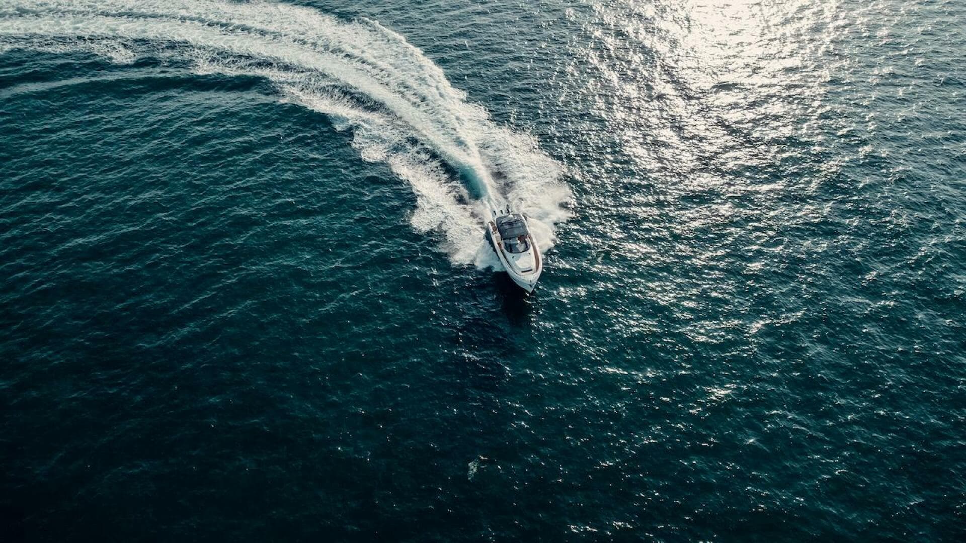 Aerial view of 2024 Oryx 379 boat cruising on open water.