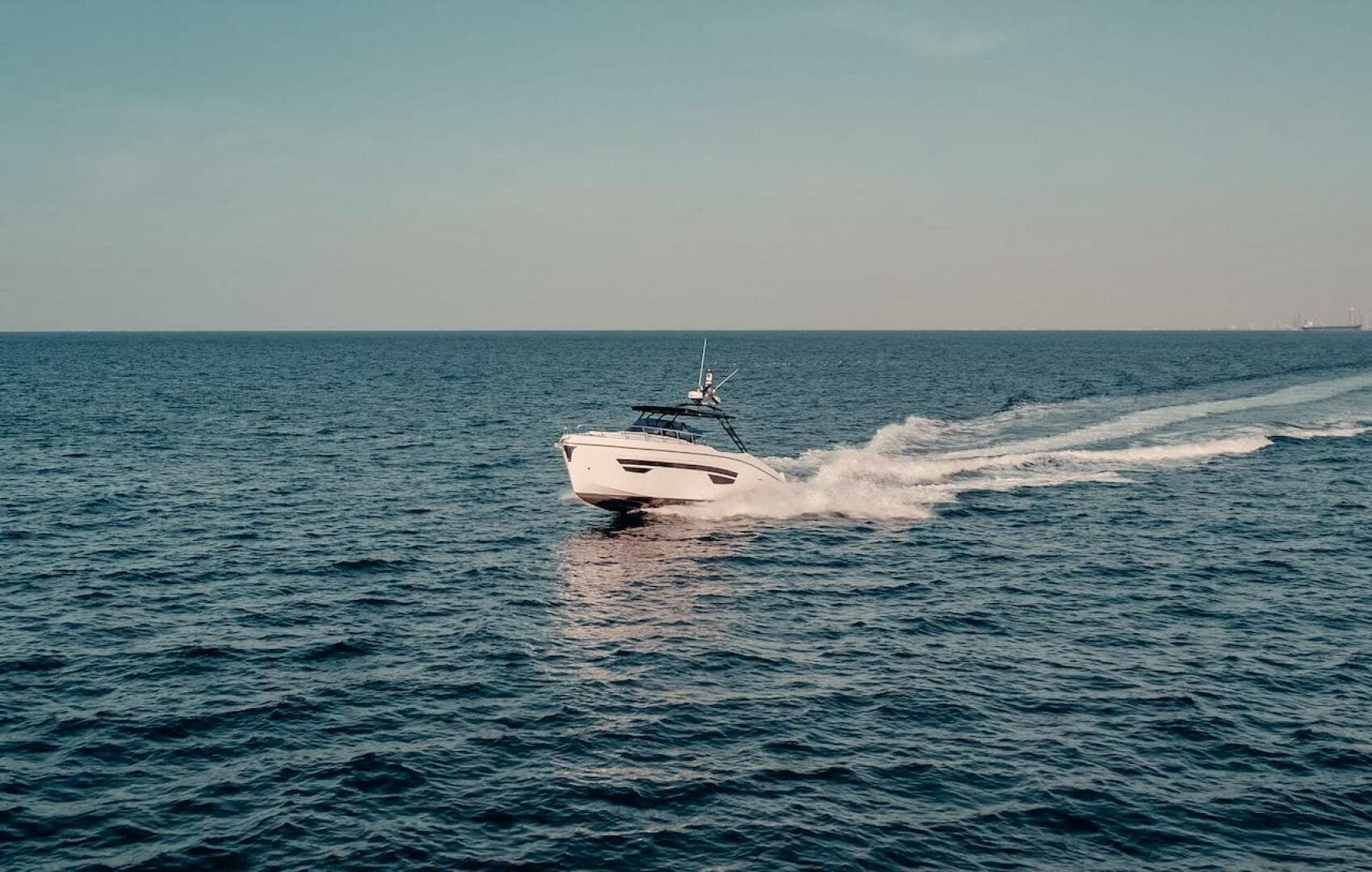 2024 Oryx 379 motor yacht cruising on open sea.