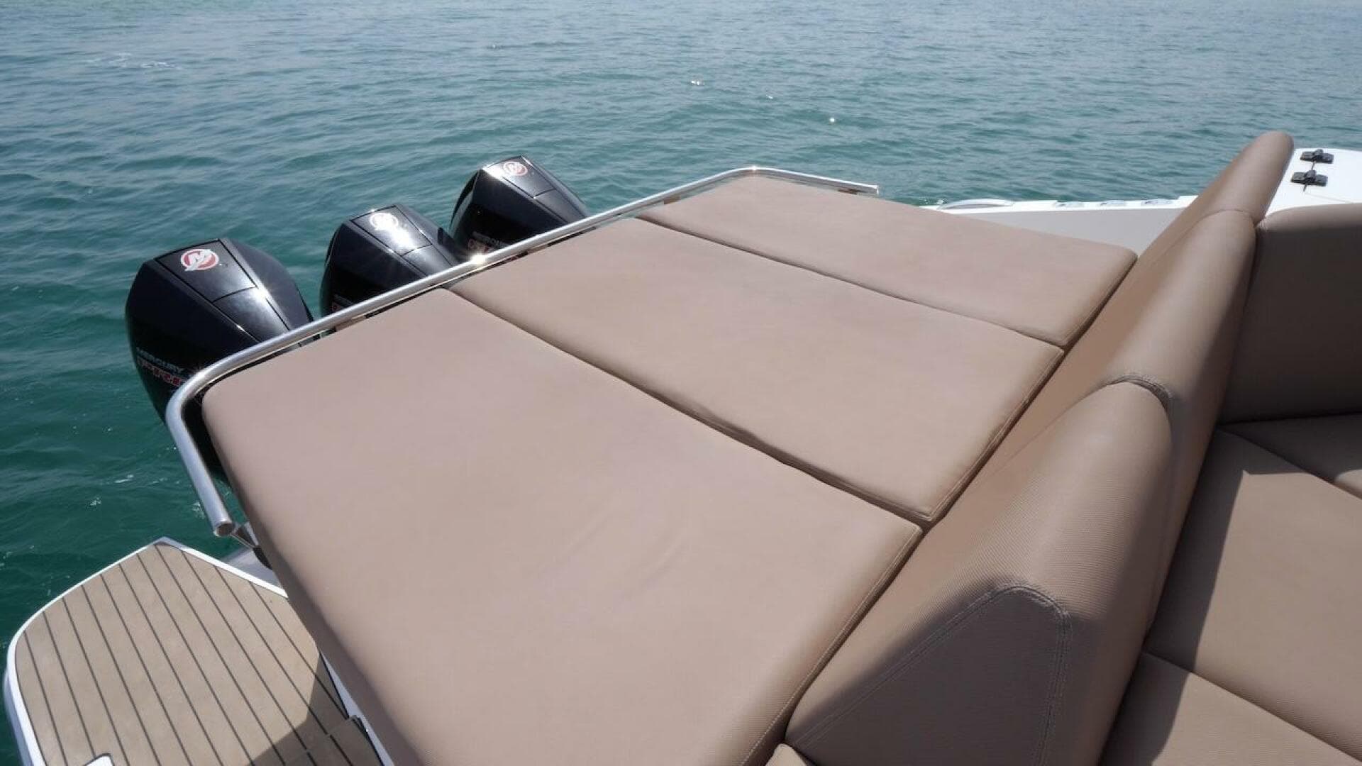 2024 Oryx 379 boat with triple outboard engines and sunbed.