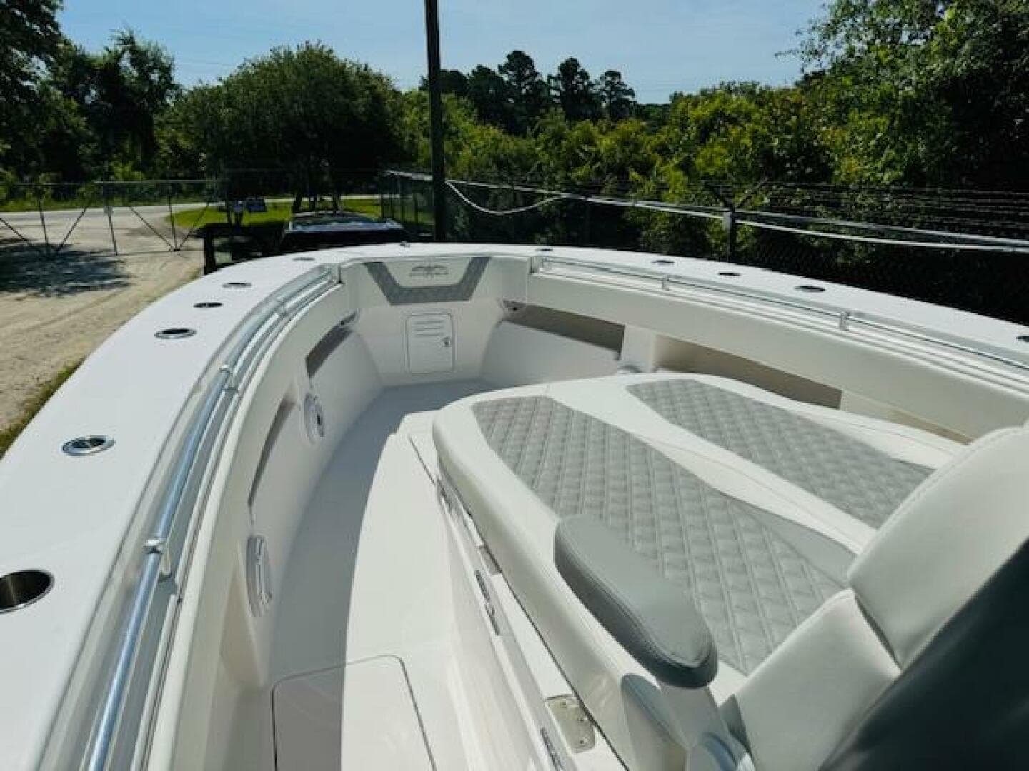 2022 Invincible 36 Open Fisherman boat with spacious seating and sleek design.