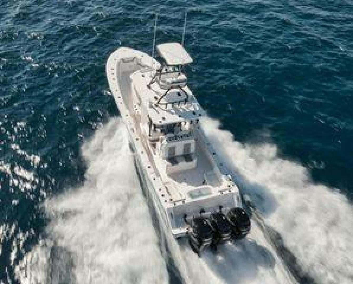 2022 Invincible 36 Open Fisherman boat cruising on open water.