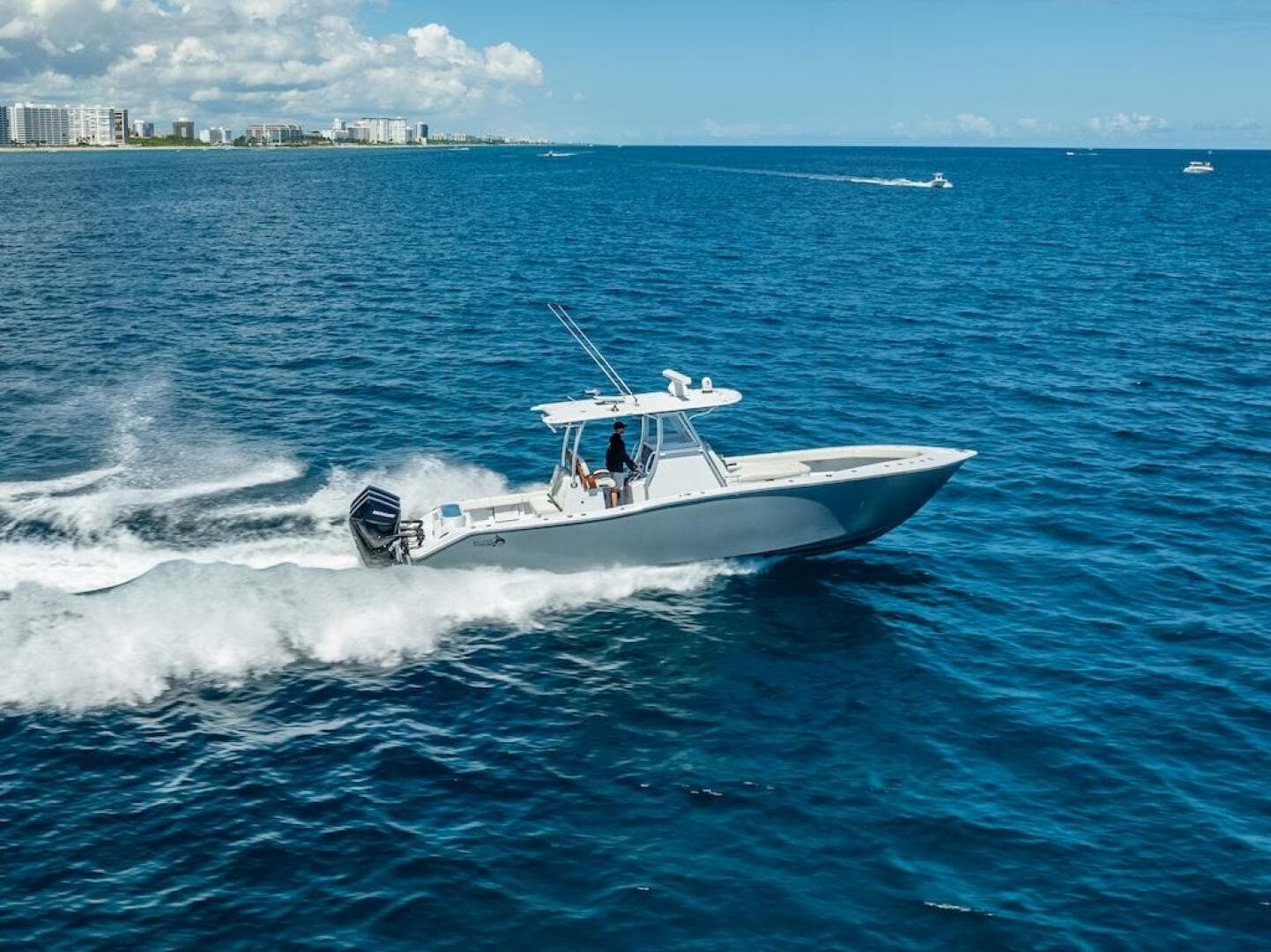 2025 Billfish 39 Center Console boat cruising on open ocean.