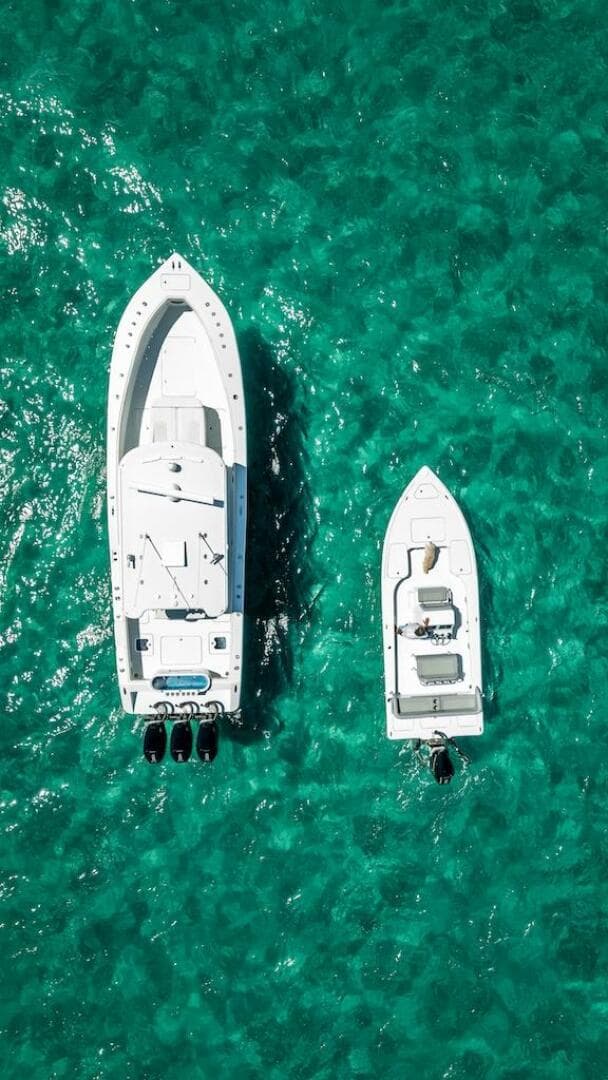 Aerial view of 2025 Billfish 39 Center Console boat on turquoise water.