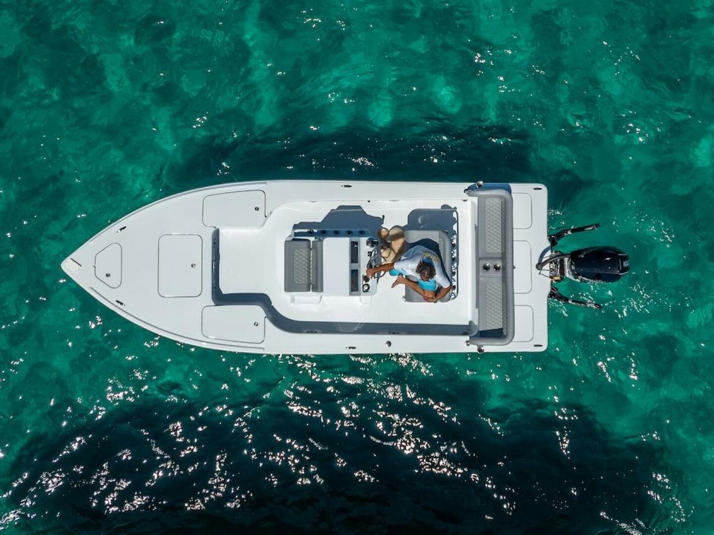 Aerial view of 2025 Billfish 39 Center Console boat on clear turquoise water.
