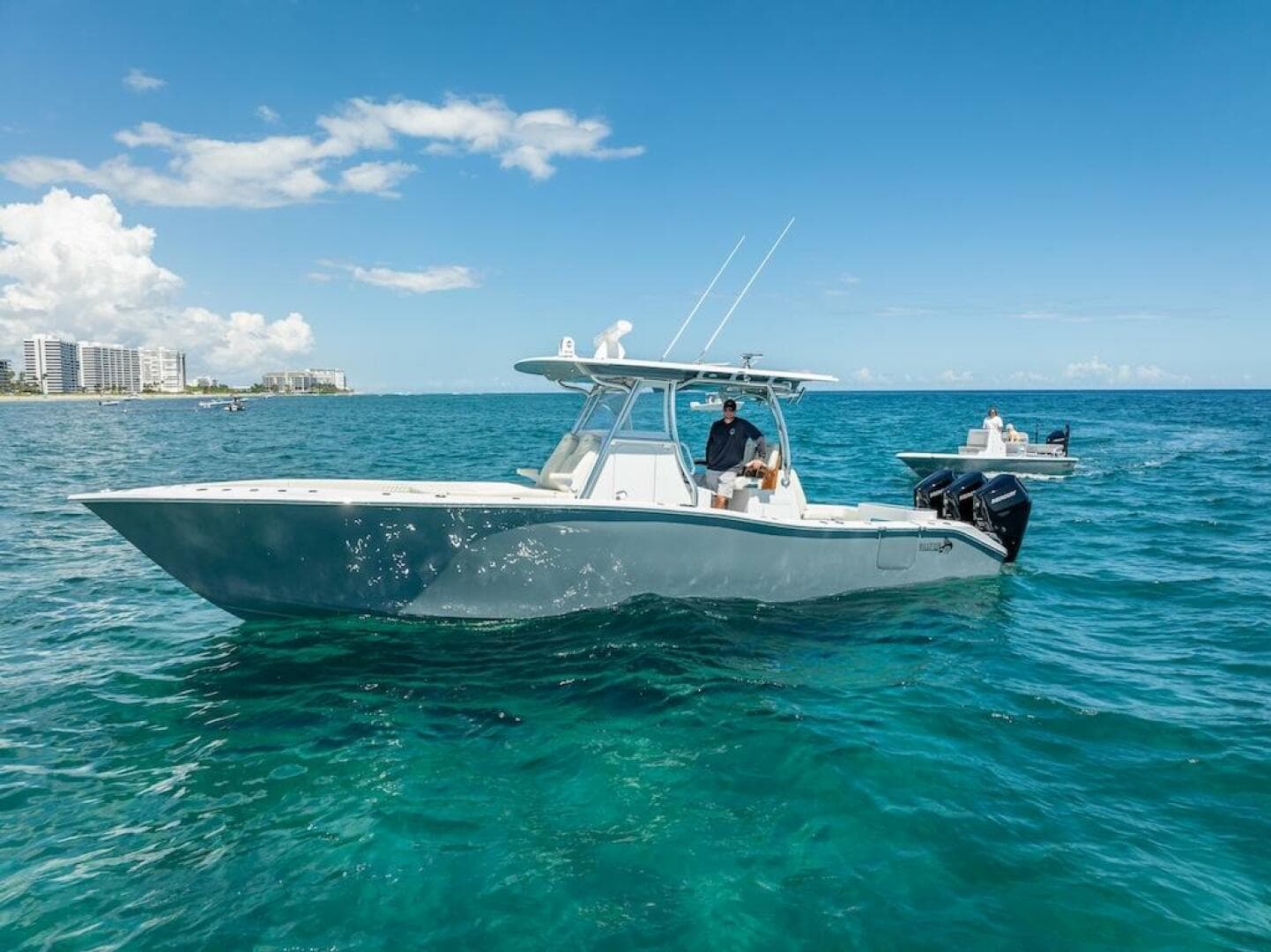 2025 Billfish 39 Center Console boat on clear blue ocean.