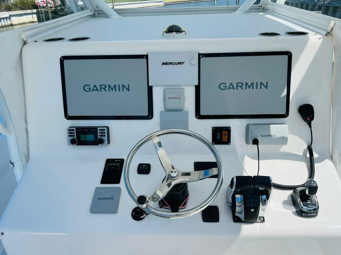 2015 Billfish 39 Custom CC helm with dual Garmin displays and Mercury controls.
