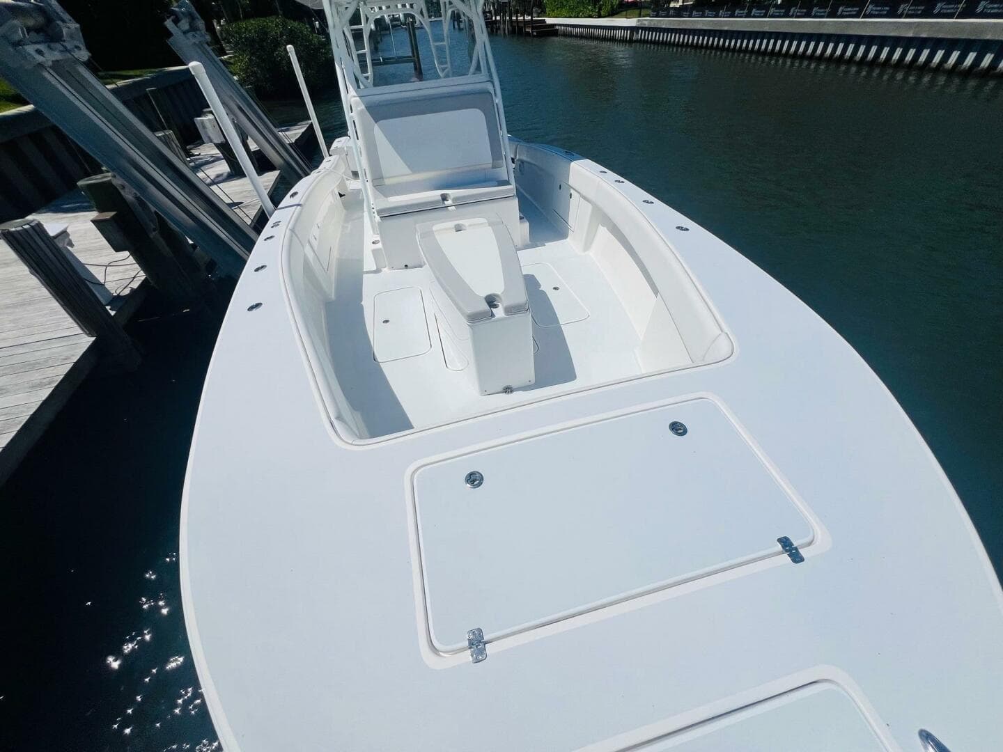 2015 Billfish 39 Custom CC boat docked by the water.