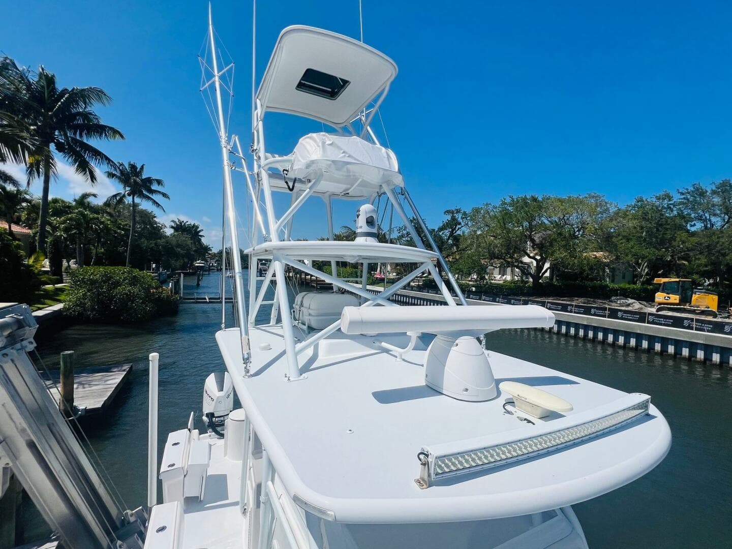 2015 Billfish 39 Custom CC boat docked in a sunny marina.