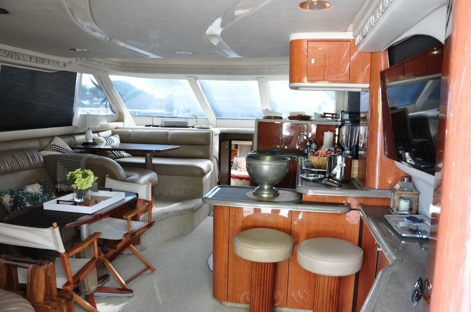 Luxurious interior of a 1998 Sea Ray 480 Sedan Bridge yacht with modern amenities.