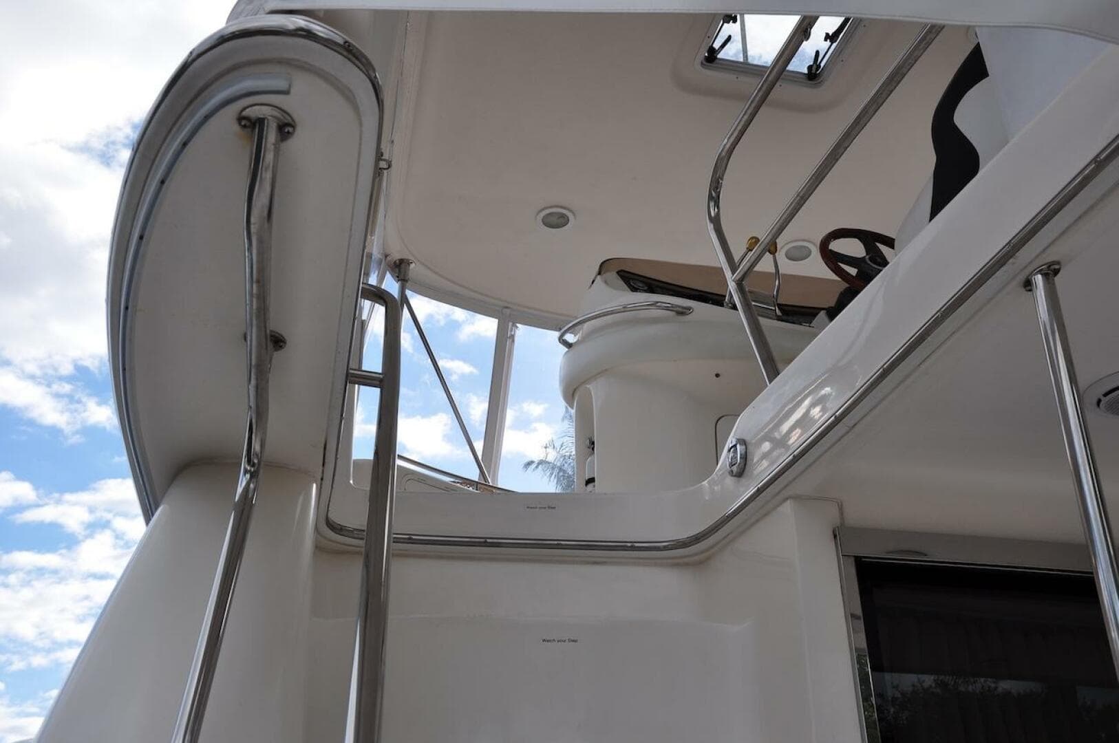 View of the upper deck and helm of a 1998 Sea Ray 480 Sedan Bridge yacht.