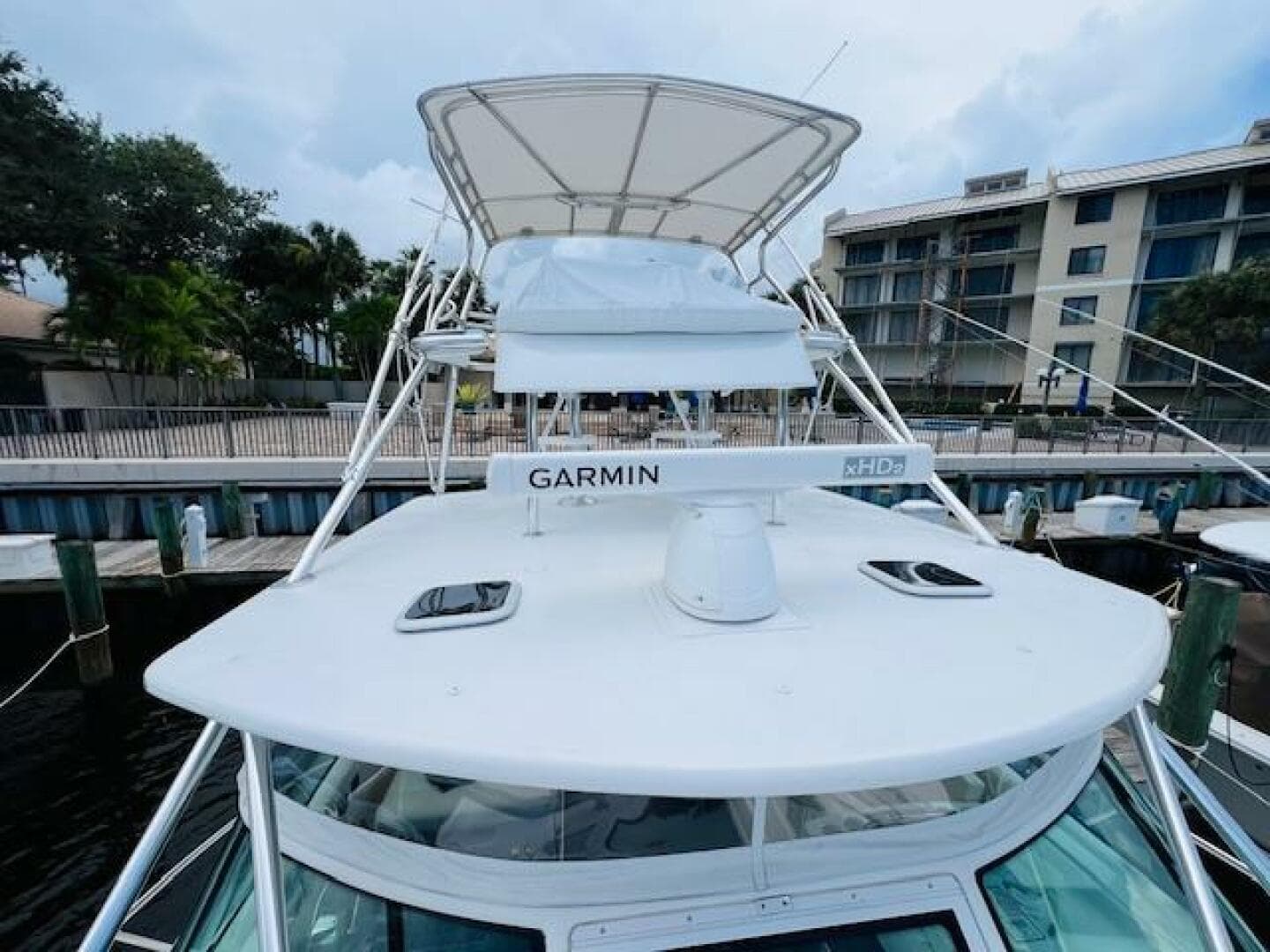 2003 Tiara Yachts 3800 Open with Garmin radar, docked at marina.
