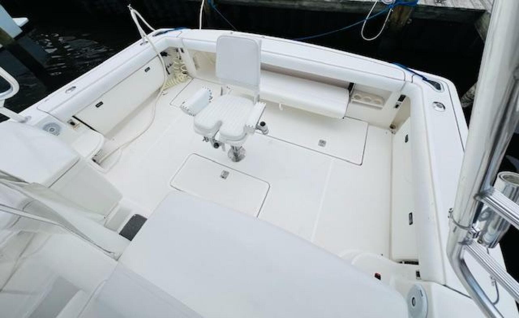 2003 Tiara Yachts 3800 Open boat deck with seating and storage.