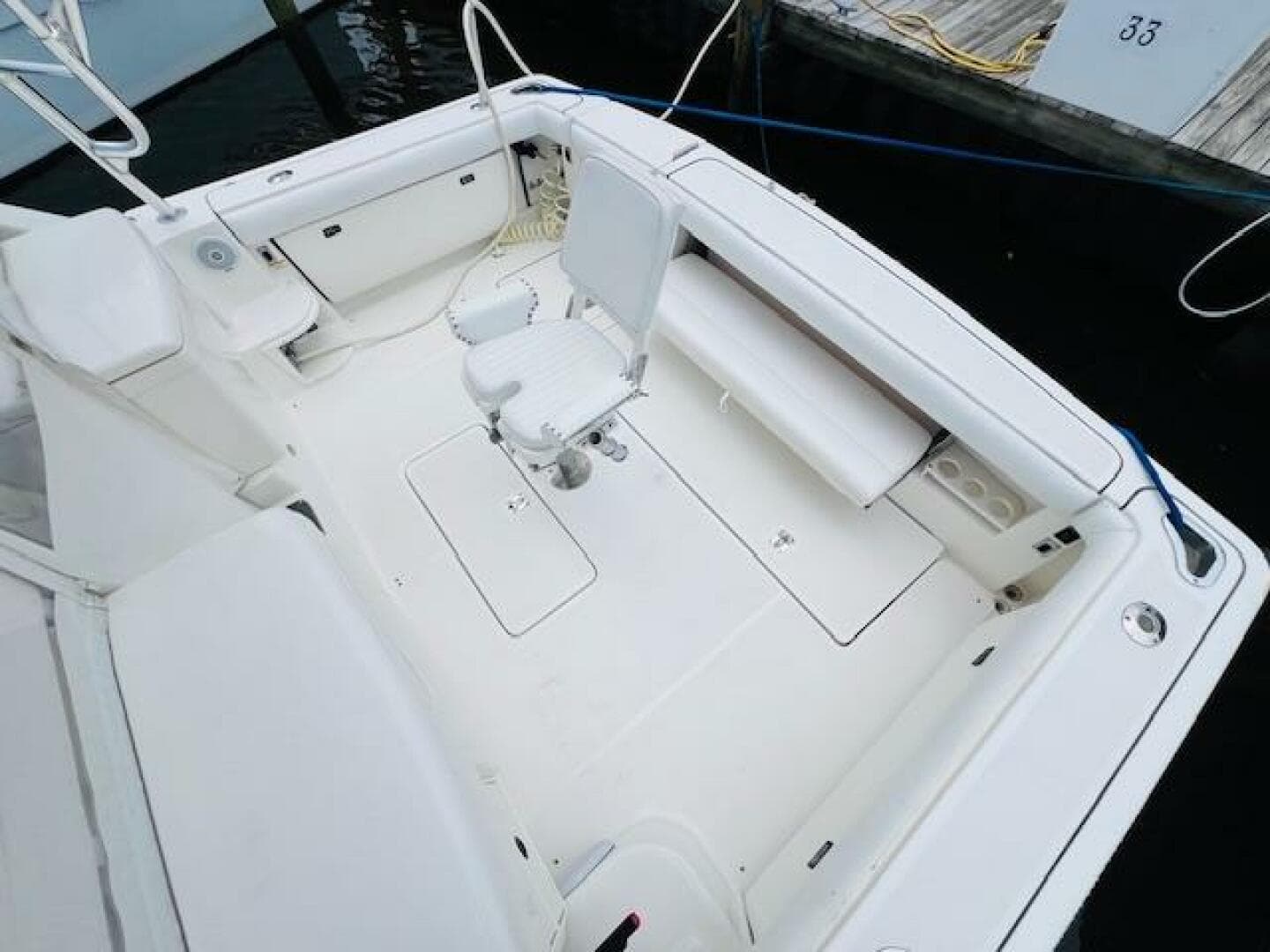 2003 Tiara Yachts 3800 Open boat deck with seating and storage.