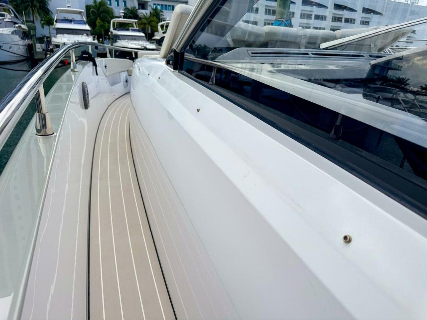 2023 Azimut Verve 47 yacht deck, sleek design, docked in marina.