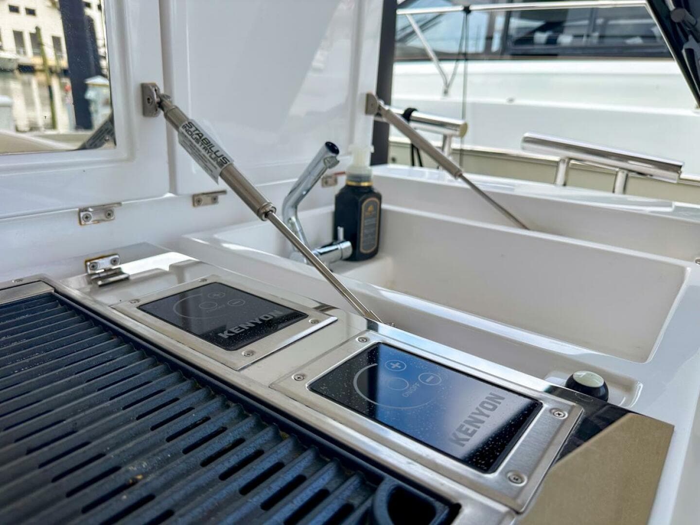 Outdoor kitchen on 2023 Azimut Verve 47 yacht with Kenyon grill.