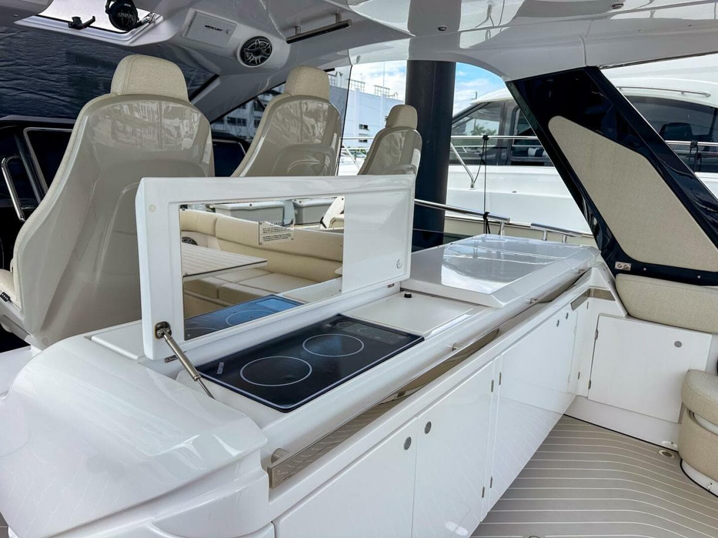 2023 Azimut Verve 47 yacht interior with modern kitchen and seating area.