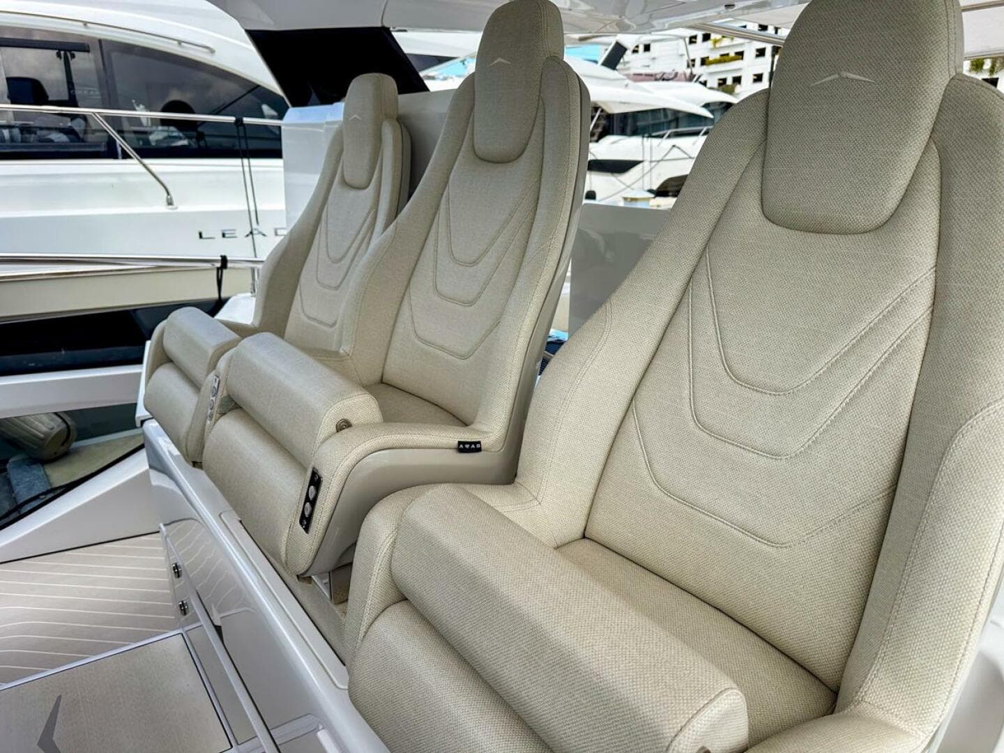 2023 Azimut Verve 47 luxury boat seats, beige upholstery, modern design.