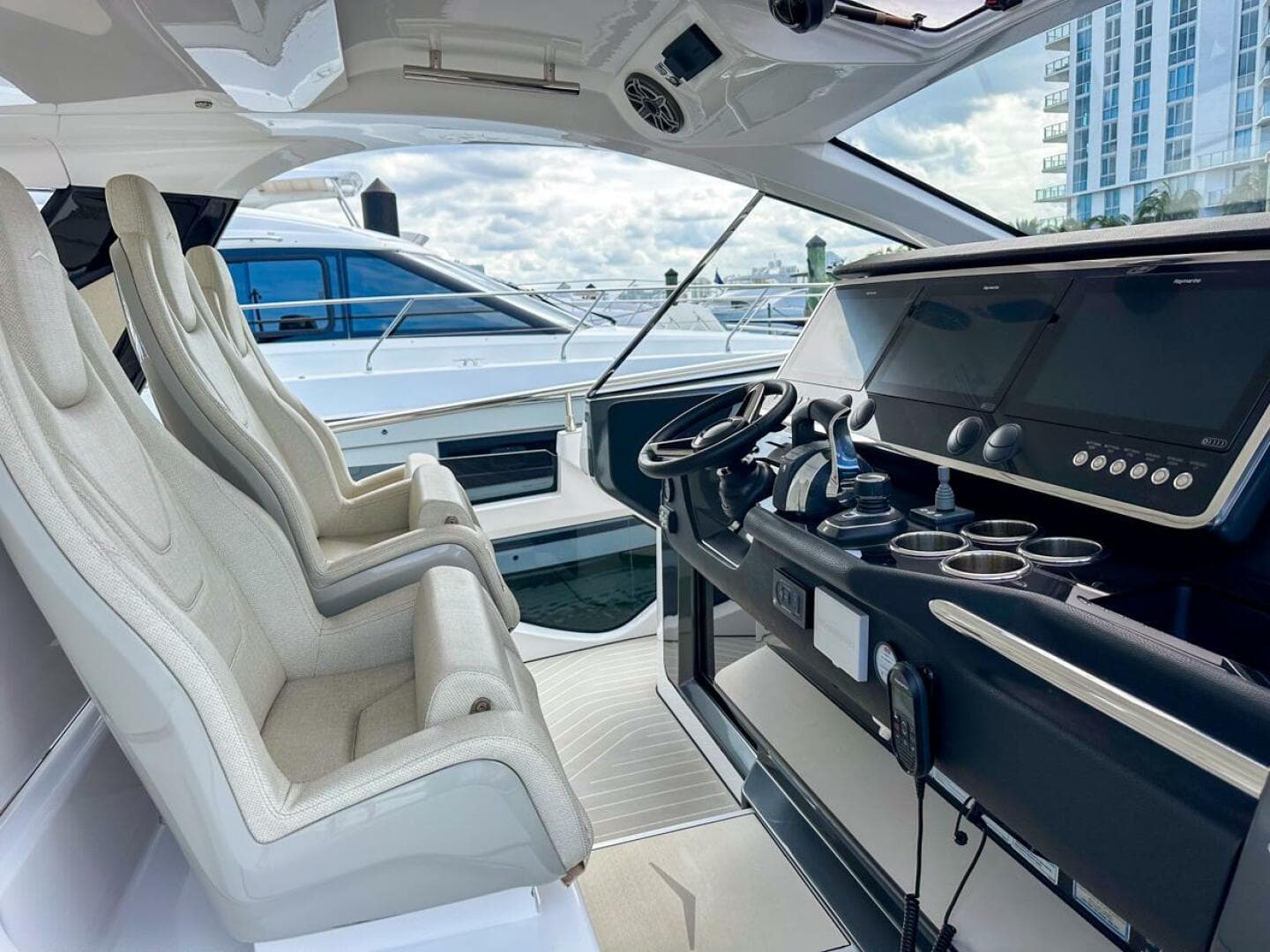 2023 Azimut Verve 47 yacht cockpit with modern controls and luxurious seating.