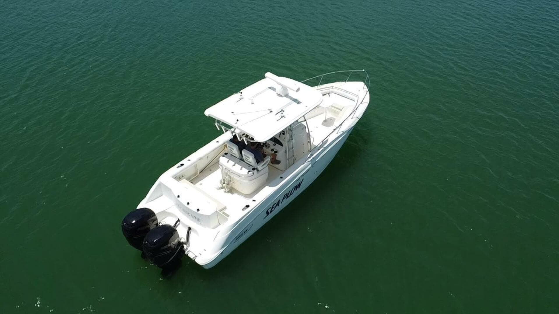 2008 Boston Whaler 320 Outrage boat on open water.