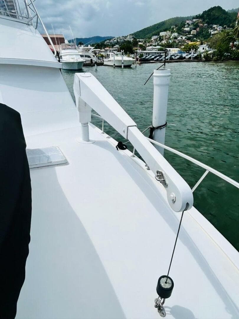 1988 Bertram 54' yacht deck with scenic marina view.