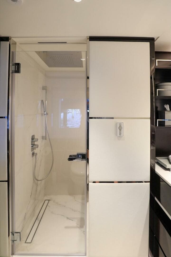 Luxurious bathroom in 2025 Majesty 120 yacht with modern shower design.
