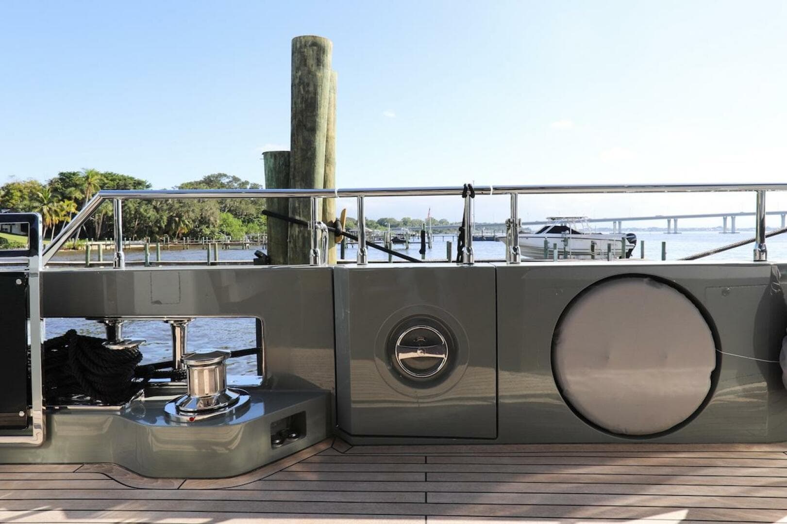 Majesty 120 yacht deck, 2025 model, docked with scenic waterfront view.