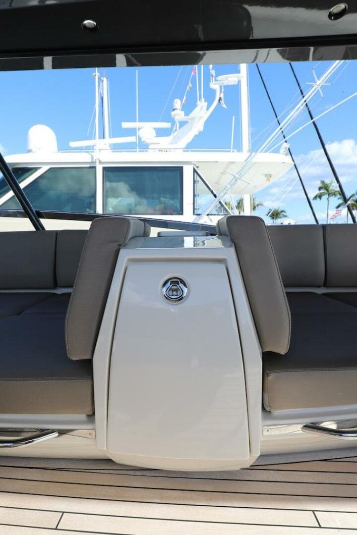 2016 Marquis 660 Sport Yacht interior with sleek seating and modern design.