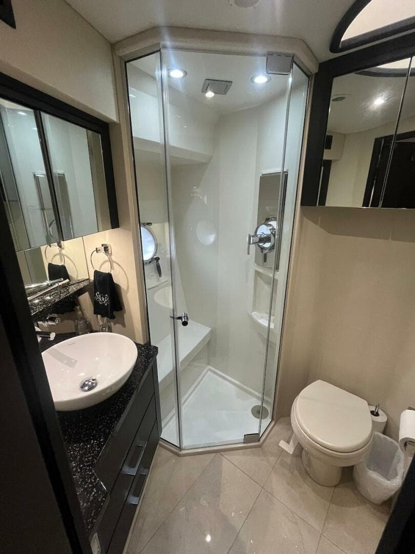 2017 Marquis 500 Sport Yacht bathroom with modern shower and sink.